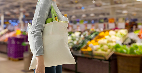 Image showing woman with reusable canvas bag for food shopping