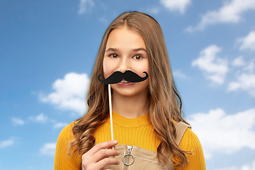 Image showing teenage girl with black moustaches party accessory