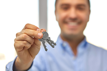 Image showing close up of smiling man holding house keys