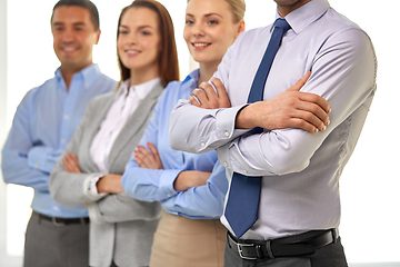 Image showing close up of smiling business people at office