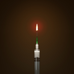 Image showing syringe candle light