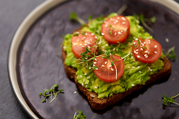 Image showing toast bread with mashed avocado and cherry tomato