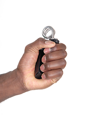 Image showing Isolated hand of African man with exercise tool