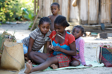 Image showing Malagasy woman from village traditional singing and dancing