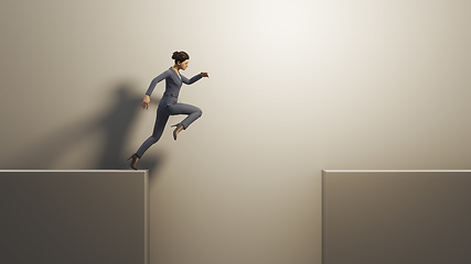 Image showing business woman jumps over a gap