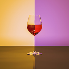 Image showing Red wine wineglass refraction