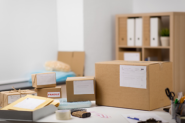 Image showing parcel boxes and packing stuff at post office