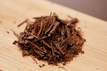 Image showing chocolate chips on wooden board