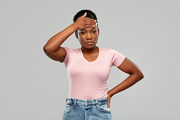 Image showing african american woman having headache or fever