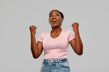 Image showing happy african american woman celebrating success