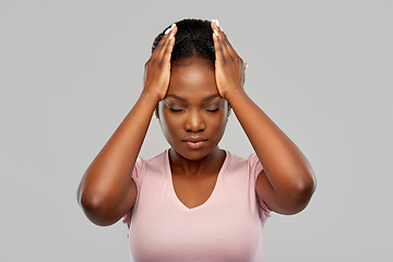 Image showing african american woman suffering from headache