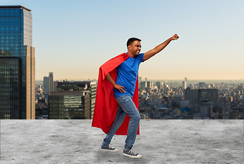 Image showing indian man in superhero cape makes winning gesture