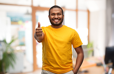 Image showing smiling african american man showing thumbs up