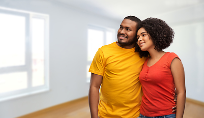 Image showing happy african american couple hugging