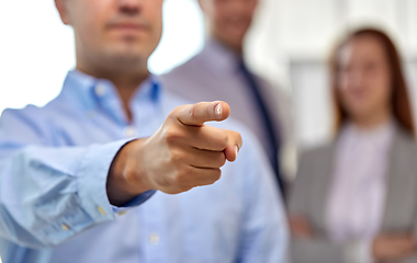 Image showing close up of businessman pointing finger