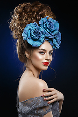 Image showing girl with beautiful high curly hairstyle