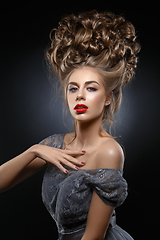 Image showing girl with beautiful high curly hairstyle