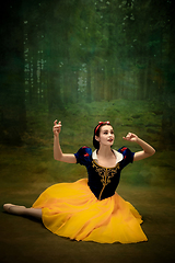 Image showing Young ballet dancer as a Snow White with poisoned apple in forest