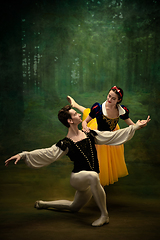 Image showing Young ballet dancers as a Snow White\'s characters in forest