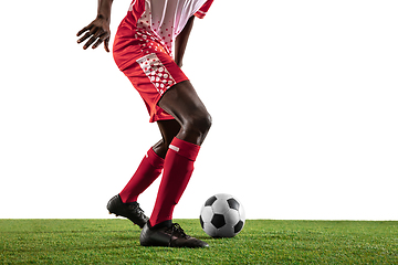 Image showing Professional african football or soccer player isolated on white background