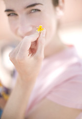 Image showing woman holding flower