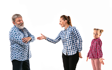 Image showing Family members arguing with one another on white studio background.