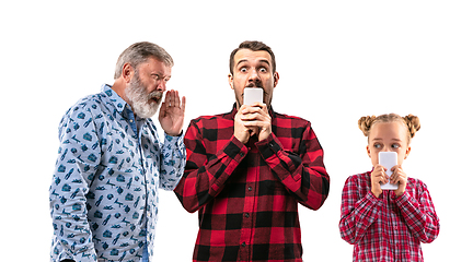 Image showing Family members arguing with one another on white studio background.