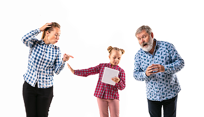 Image showing Family members with one another on white studio background.