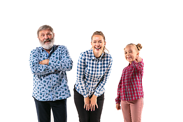 Image showing Happy family with child looks happy together on white background