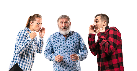 Image showing Family members arguing with one another on white studio background.