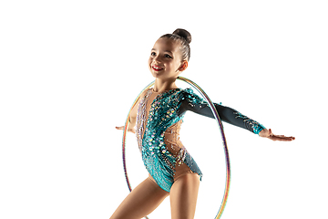 Image showing Little flexible female gymnast isolated on white studio background