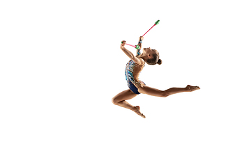 Image showing Little flexible female gymnast isolated on white studio background