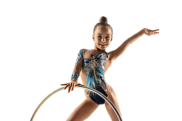 Image showing Little flexible female gymnast isolated on white studio background