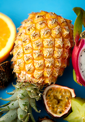 Image showing close up of pineapple with other exotic fruits
