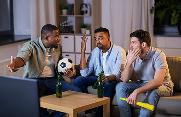 Image showing friends with ball and vuvuzela watching soccer