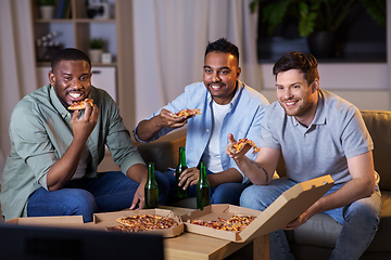 Image showing happy male friends with beer eating pizza at home