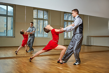 Image showing beautiful couple dancing tango