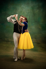 Image showing Young ballet dancers as a Snow White\'s characters in forest modern tales