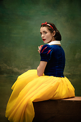 Image showing Young ballet dancer as a Snow White with poisoned apple in forest