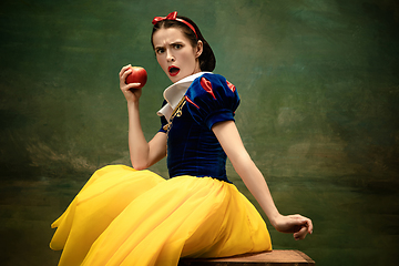 Image showing Young ballet dancer as a Snow White with poisoned apple in forest