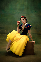 Image showing Young ballet dancer as a Snow White with poisoned apple in forest