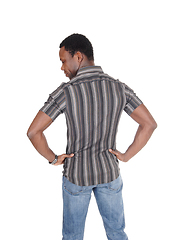 Image showing Handsome tall African man standing from back