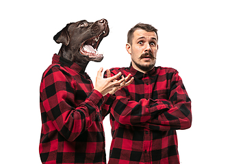 Image showing Man arguing with himself as a dog on white studio background.