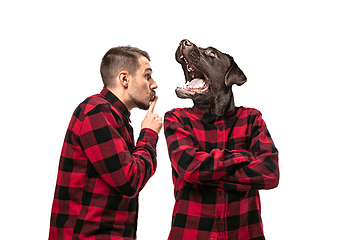 Image showing Man arguing with himself as a dog on white studio background.