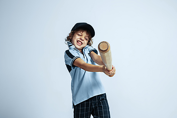 Image showing Pretty young boy in casual clothes on white studio background