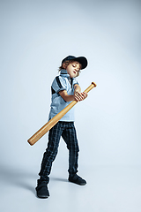 Image showing Pretty young boy in casual clothes on white studio background