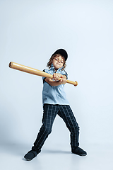 Image showing Pretty young boy in casual clothes on white studio background