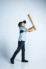 Image showing Pretty young boy in casual clothes on white studio background