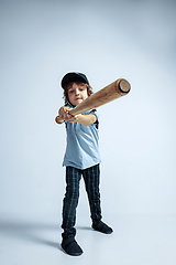 Image showing Pretty young boy in casual clothes on white studio background