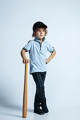 Image showing Pretty young boy in casual clothes on white studio background